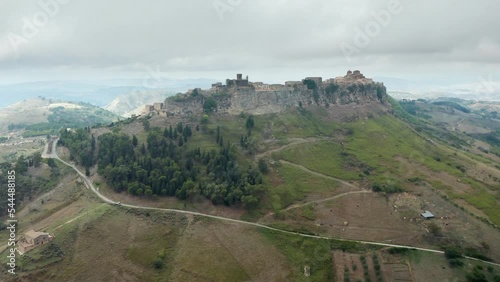 Road On Mountain Hills Leading To Calascibetta Comune In Enna, Sicily, Italy. - aerial photo
