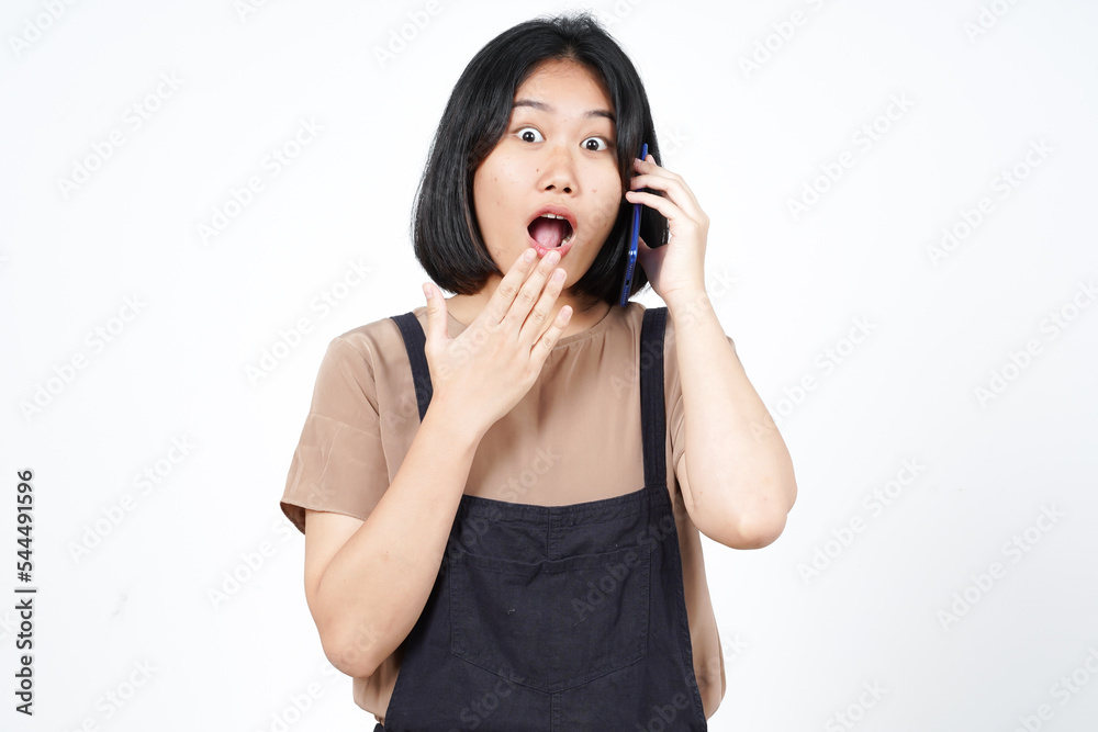 Talking on the smartphone and surprised face of Beautiful Asian Woman Isolated On White Background Talking on the smartphone and surprised face of Beautiful Asian Woman Isolated On White Background