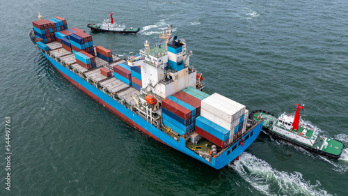 Container cargo ship arrive commercial deep seaport, Global business import export commerce trade logistic transportation International container cargo ship boat in open sea, Freight shipping maritime