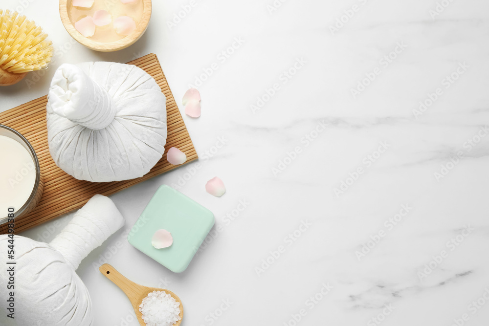 Flat lay composition with different spa products on white marble table. Space for text Flat lay composition with different spa products on white marble table. Space for text