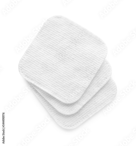 Soft clean cotton pads on white background, top view