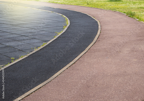 Close-up of a part of a sports stadium with markings for a treadmill © clairelucia