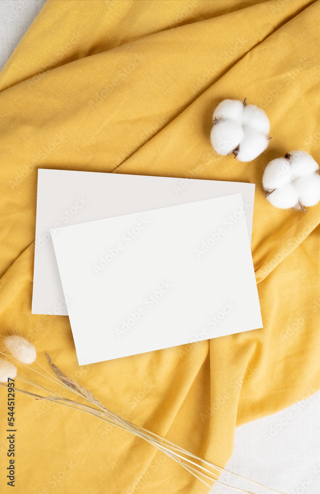 Invitation card mockup on table setting, minimal scandinavian theme Invitation card mockup on table setting, minimal scandinavian theme