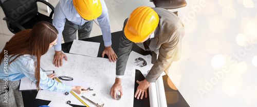 Group of engineers working ...