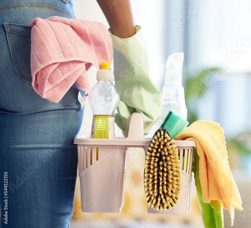 Hand, cleaning products and home supplies for house cleaning service. Cleaner, chemical basket and hygiene safety tools for spring clean worker in latex gloves with chemical sanitation container