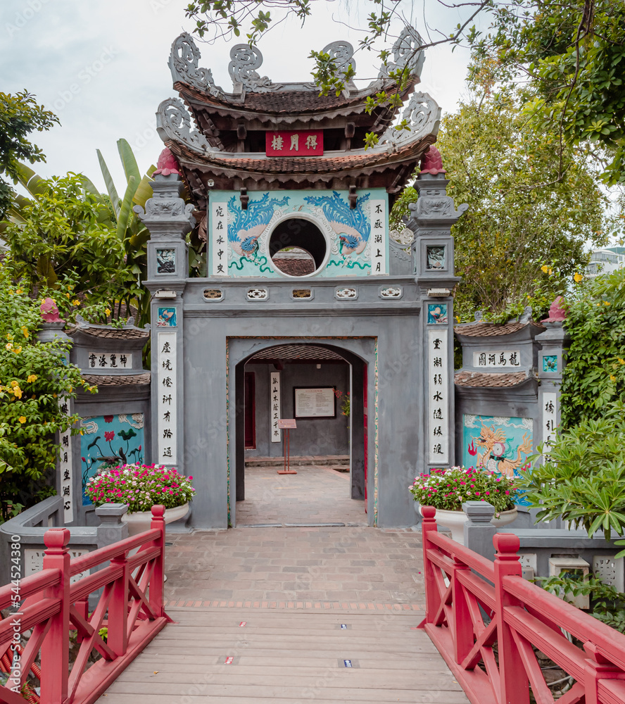 Colorful traditional Vietnamese architecture gate structure design at the Ngọc Sơn Temple on the Hoan Kiem lake in Hanoi Vietnam	