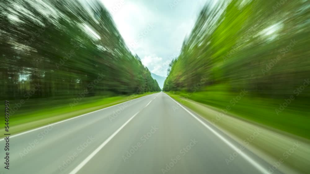 Fast Speedy Day Drive By Car On Country Rural Road Motion Timelapse. Windshield View to the Road with Overtaking Cars. Hyperlapse Road Trip Travel Concept Sort of Dashcam POV Fast Speedy Day Drive By Car On Country Rural Road Motion Timelapse. Windshield View to the Road with Overtaking Cars. Hyperlapse Road Trip Travel Concept Sort of Dashcam POV