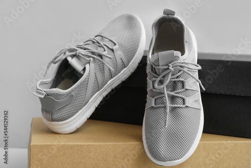 Pair of gray mesh athletic ...