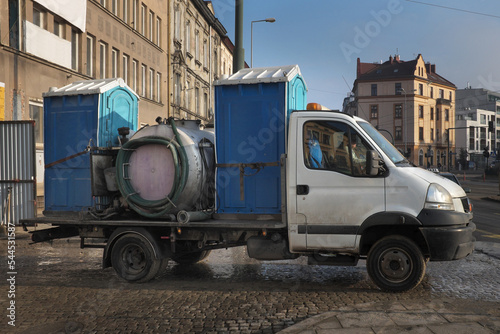 Transportation of portable toilets in the city ...