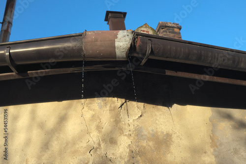 Leaky old gutter, badly repaired ...