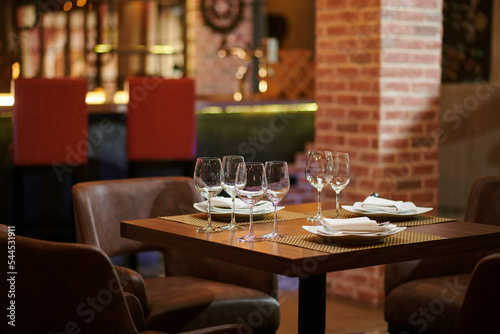 Restaurant Table with Plates and Glasses
