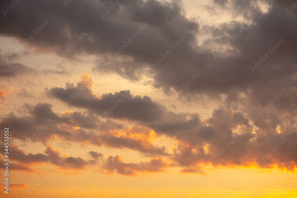 Colorful clouds at sunset as background.