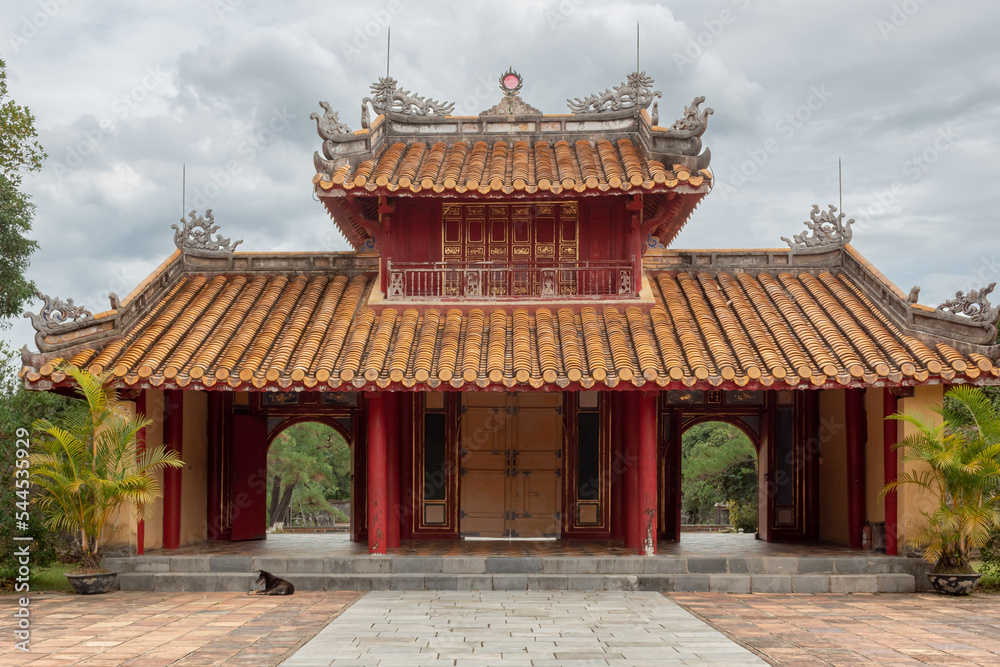 Fototapeta premium Colorful traditional style tomb building structure at the Mausoleum of Emperor Minh Mang in Hue Vietnam