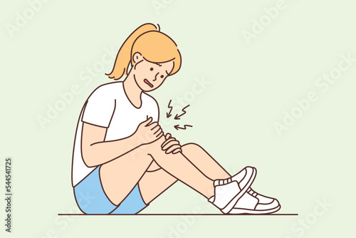 Unhealthy girl with knee pain 