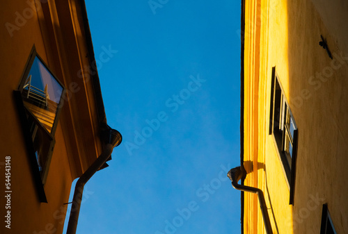 Details of yellow houses on Gamla Stan island in Stockholm, Sweden