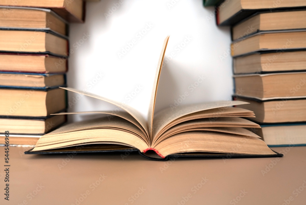 background from many books. reading culture. open old book background from many books. reading culture. open old book