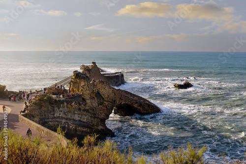 Sunset on the famous rock of the Virgin in the city of Biarritz on the Basque coast