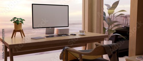 Comfortable and urban home workspace with computer mockup on wood table against the window