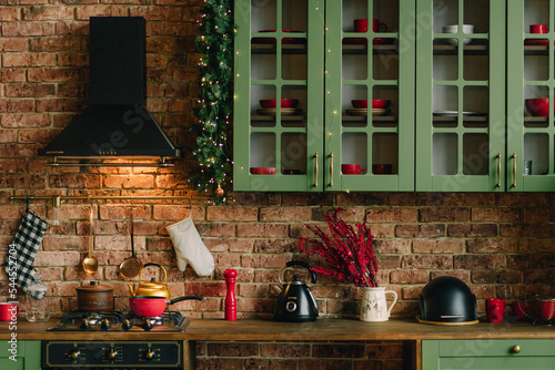 Christmas kitchen decoration, New Year's interior, festive dinner photo