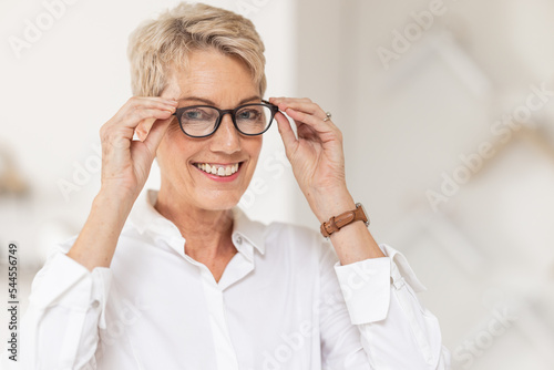 Glasses, vision and optometry with a woman customer at the optician shopping for new frame spectacles. Portrait, eyewear and retail with a female consumer buying prescription lenses at an optometrist