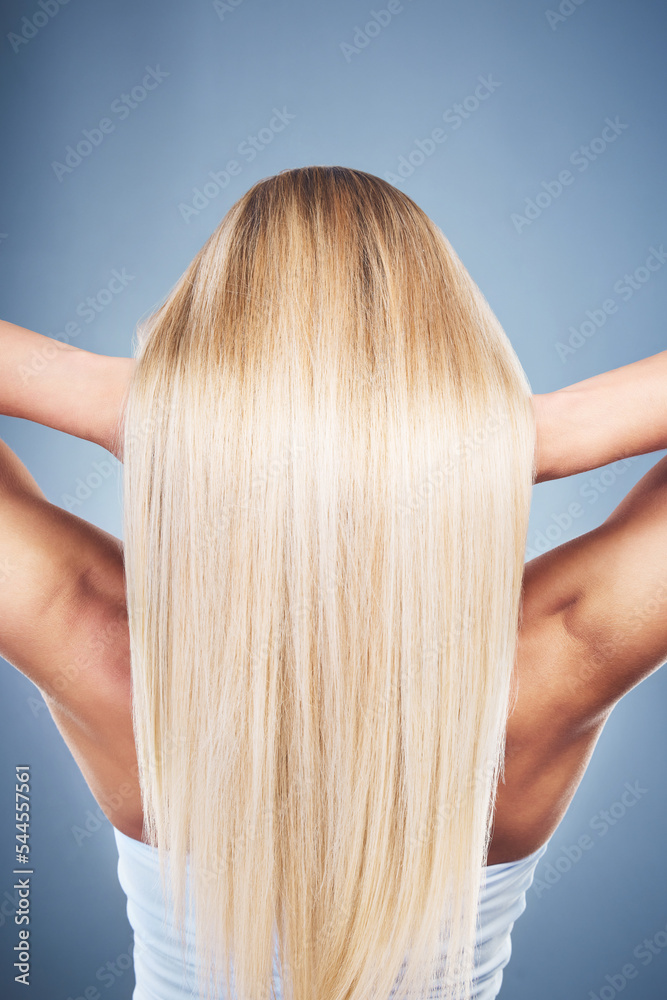 Fototapeta premium Woman, beauty and blonde hair or cosmetics hair care wellness mockup in studio. Model, healthy professional haircare and natural colour care shine or hairstyle treatment against blue background
