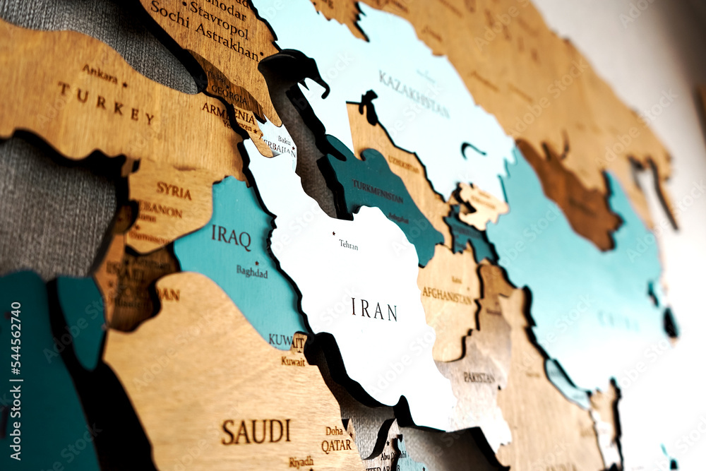 Near East on the political map. Iraq, Iran, Syria, Turkey, Afghanistan, Pakistan, Egypt on wooden world map on the wall. - obrazy, fototapety, plakaty 