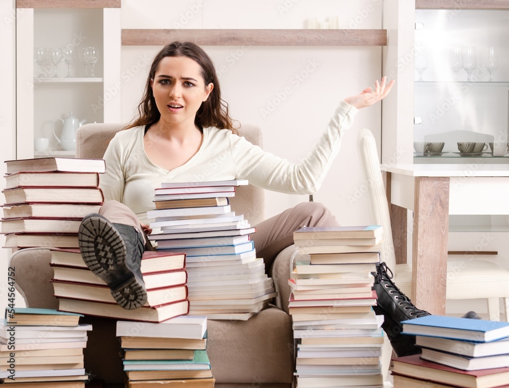 Young female student preparing for exams at home Young female student preparing for exams at home