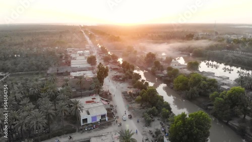 Aerial shot of rural life in Pakistan in a bright morning. photo