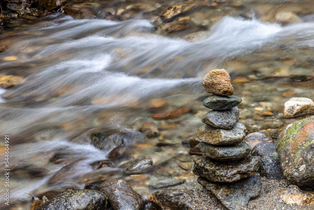 Mountain stream and stone tower