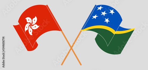 Crossed and waving flags of Hong Kong and Solomon Islands
