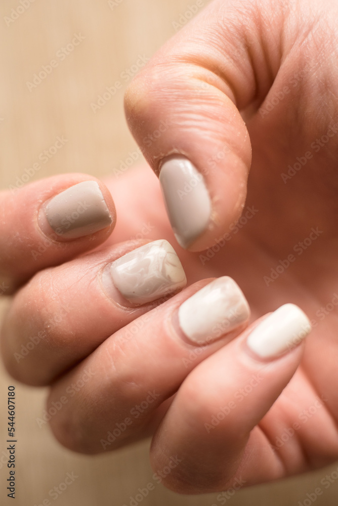 Manicure requires correction. Overgrown manicure. Female hands with overgrown nails. Time for correction gel polish. Manicure requires correction. Overgrown manicure. Female hands with overgrown nails. Time for correction gel polish.