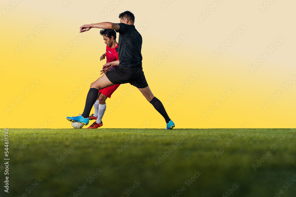 Football player playing ball in the outdoor stadium. Football player playing ball in the outdoor stadium.