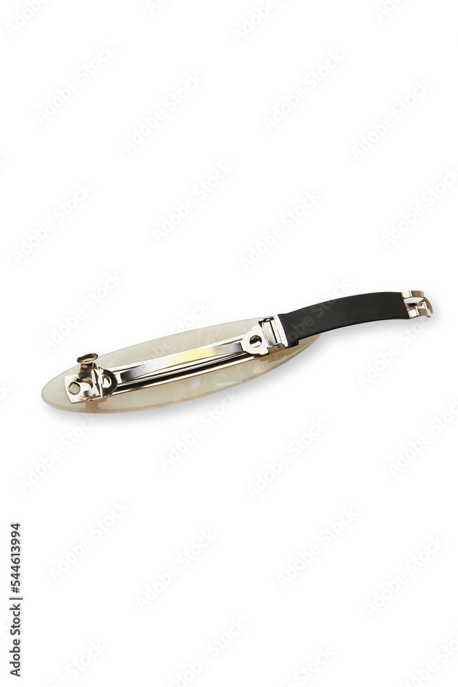 Subject shot of a glittering hair clip in the shape of an oval. The open golden hair clip is isolated on the white background. Vogue accessory for ladies and girls. Subject shot of a glittering hair clip in the shape of an oval. The open golden hair clip is isolated on the white background. Vogue accessory for ladies and girls.