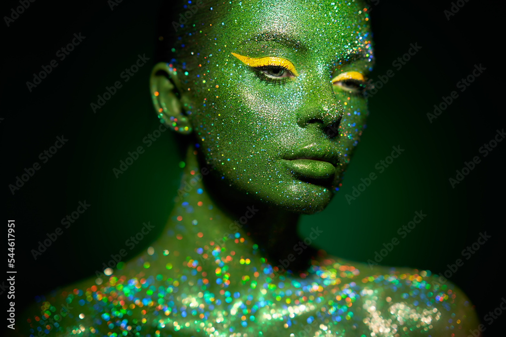 Fashion model woman skin face in bright sparkles, colorful neon lights