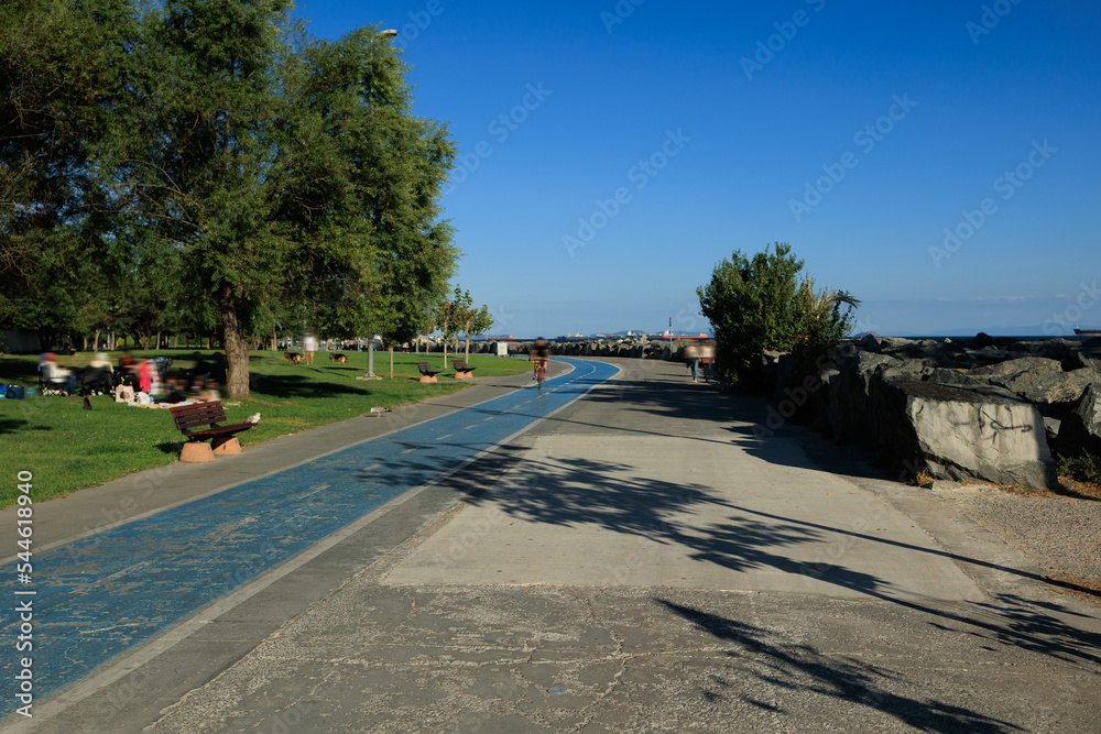 Sea coast, promenade for walks and stones, breakwaters and ships. On the streets in Istanbul, public places. Sea coast, promenade for walks and stones, breakwaters and ships. On the streets in Istanbul, public places.