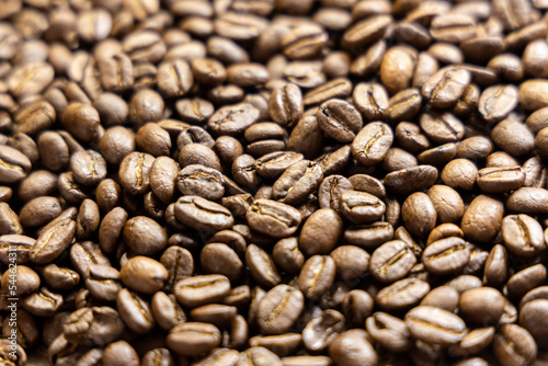 Background of roasted coffee beans. Full bean coffee