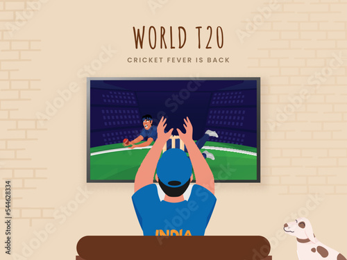 Back View Of India Supporter Man Watching World T20 Cricket Match In LCD Screen On Beige Brick Wall Background.