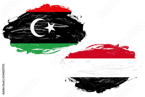 Libya and yemen flag together on a white stroke brush background photo