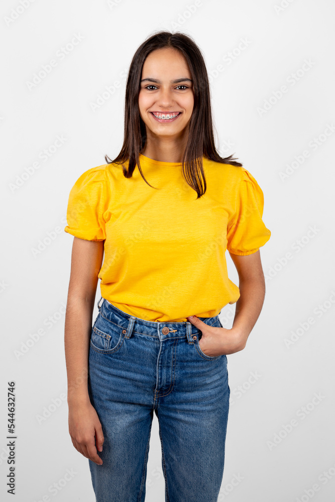Portrait of a happy and confident teen girl isolated on white Portrait of a happy and confident teen girl isolated on white