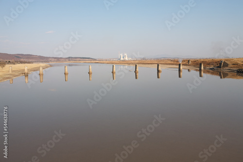 Old broken railway bridge, on Tumen River, Jilin Province, where the East Manchuria Railway was crossing from China (Hunchun) to North Korea (Hunyung), Yanbian Korean Autonomous Prefecture photo