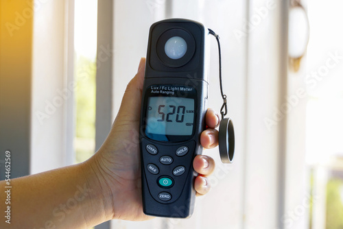 Light meter, Lux Light Meter hold in hand to measure the brightness of work light and every environment. soft and selective focus.