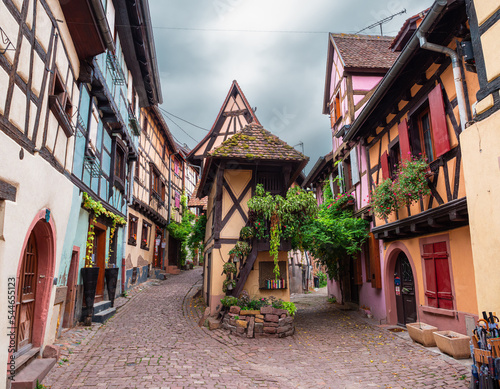 Eguisheim, France - October 12, 2022: Traditional medieval houses in Eguisheim in Alsace along the wine road