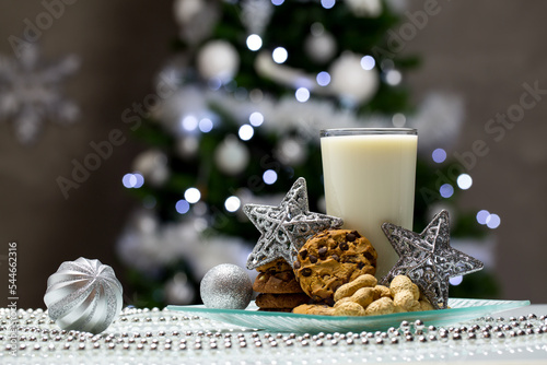 One glass of milk with cookies Christmas tree