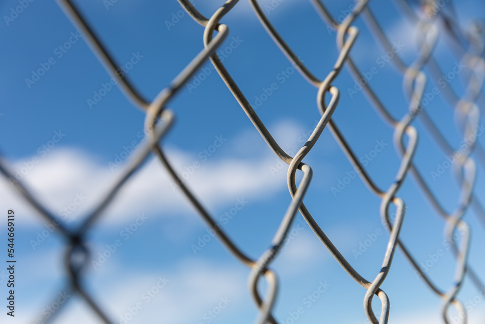 Fototapeta premium metal fence against blue sky