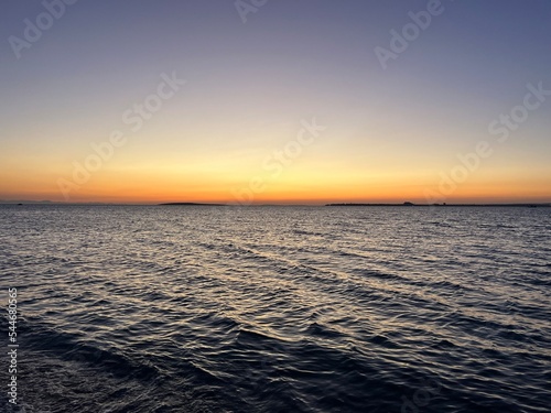 Orange sea sunset  evening quiet sea horizon 