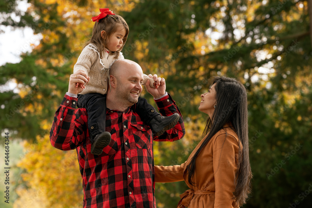 Obraz premium A functional multi ethnic family, spending precious time together outdoors
