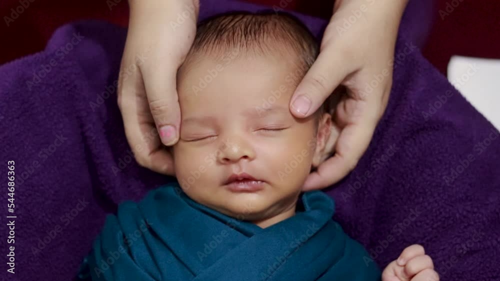 mom touching newborn baby face with love and care form top angle mom touching newborn baby face with love and care form top angle