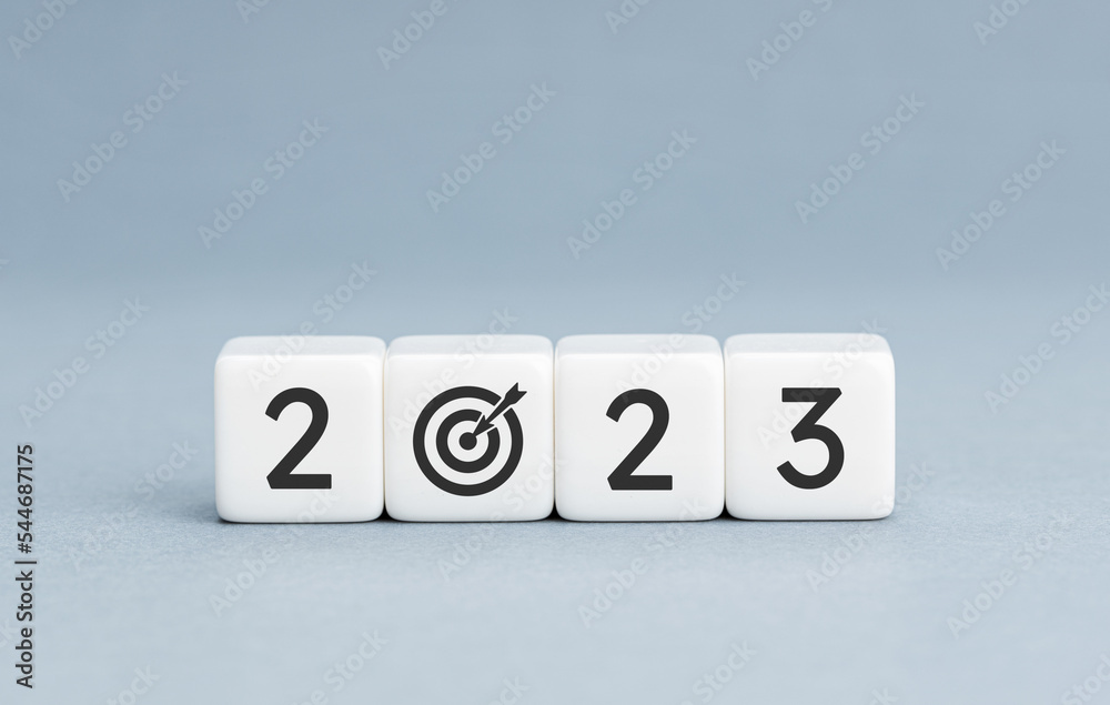 2023 year goal concept. White blocks with 2023 number and goal target icon on blue background. Copy space 2023 year goal concept. White blocks with 2023 number and goal target icon on blue background. Copy space