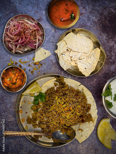 Tamarind rice and side dishes- a South Indian meal photo