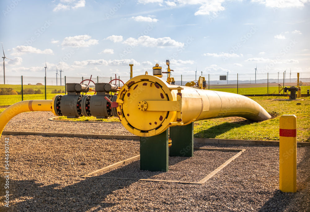 Big gas pipe natural gas transport system. Transmission infrastructure coming from the ground